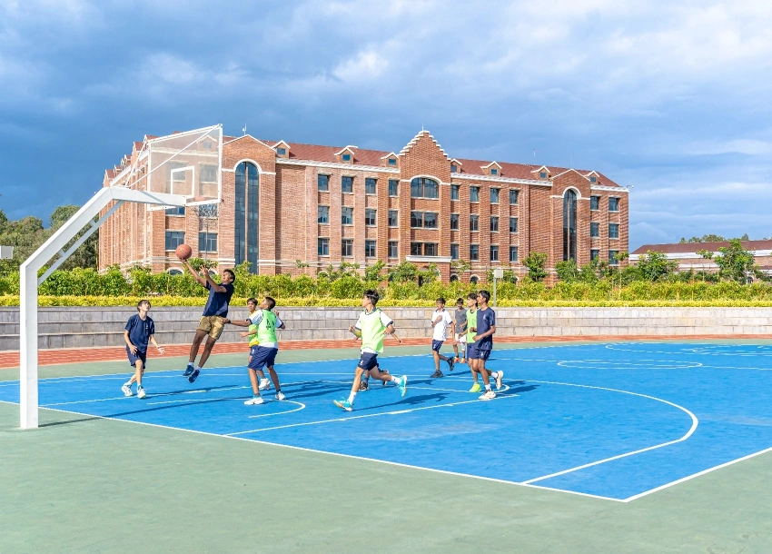 Students playing basketball
